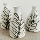 White stoneware bottle