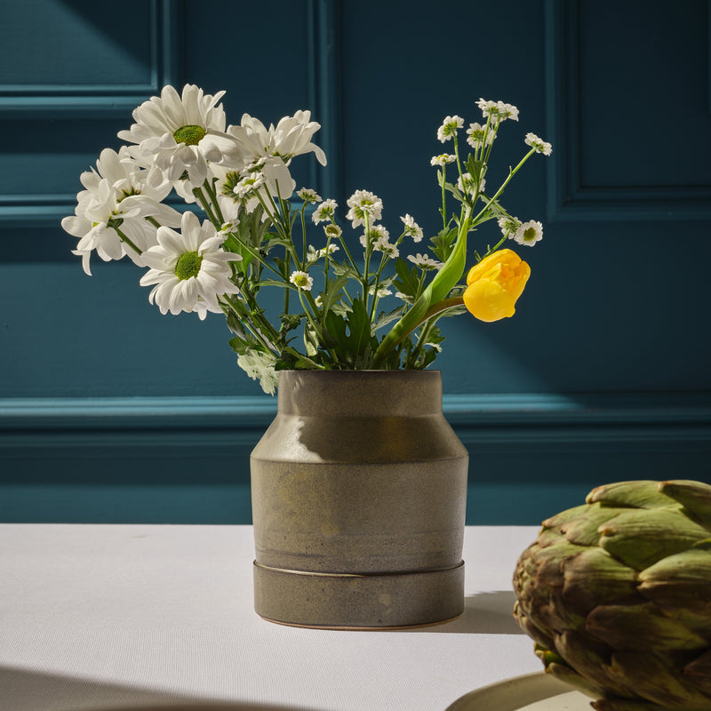 Small green stepped vase
